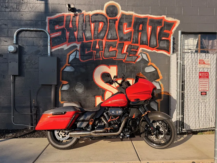 Custom red Harley bagger built by Syndicate Cycle in Oroville, CA